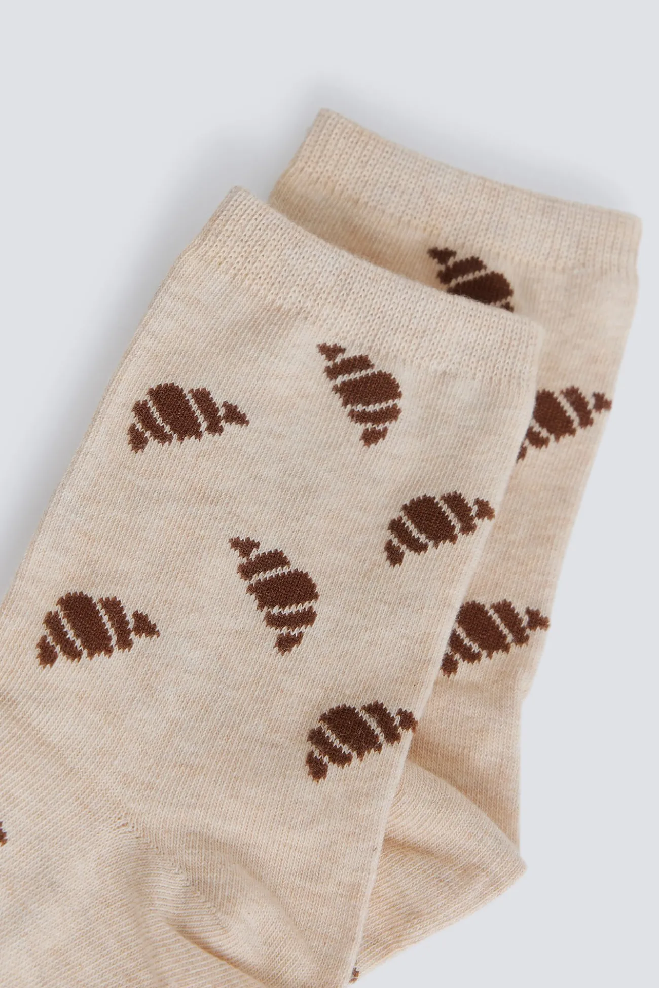 Chaussette longue à motifs croissants