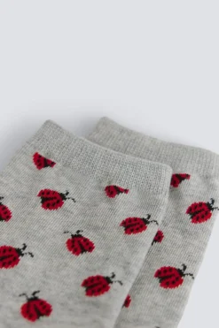Chaussette longue &agrave; coccinelles
