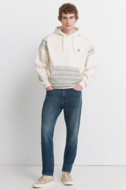 Jeans en knit denim surteint coupe slim