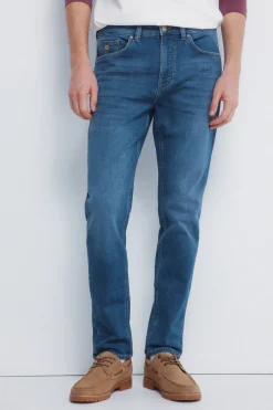 Jeans slim en denim tricot&eacute;