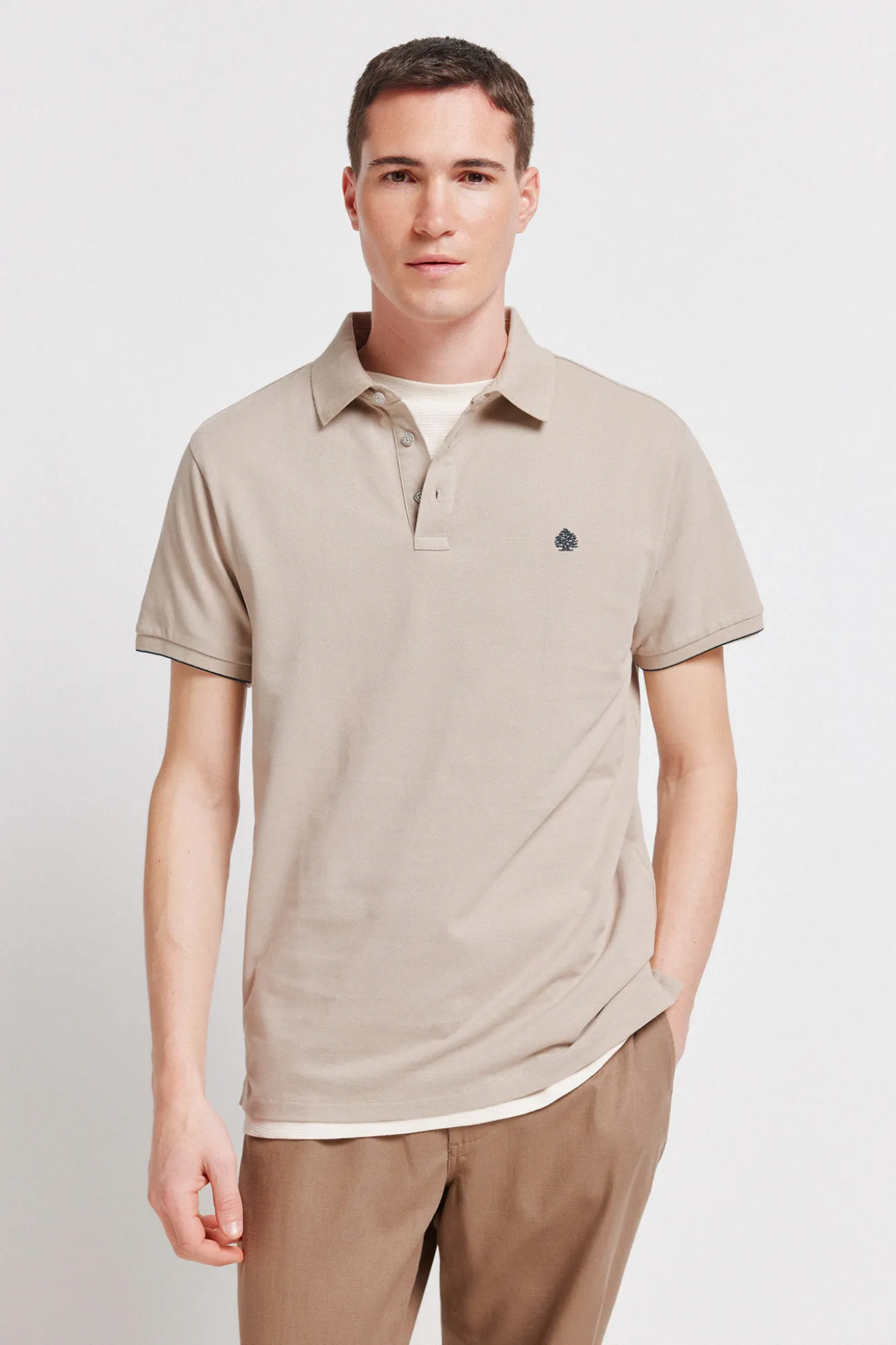 Polo en piqué coupe slim à poignets contrastants