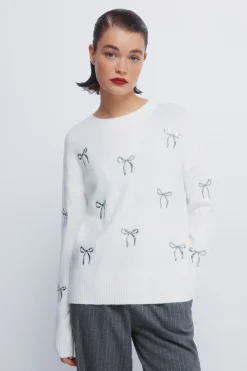 Pull avec nœuds à paillettes