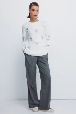 Pull avec nœuds à paillettes