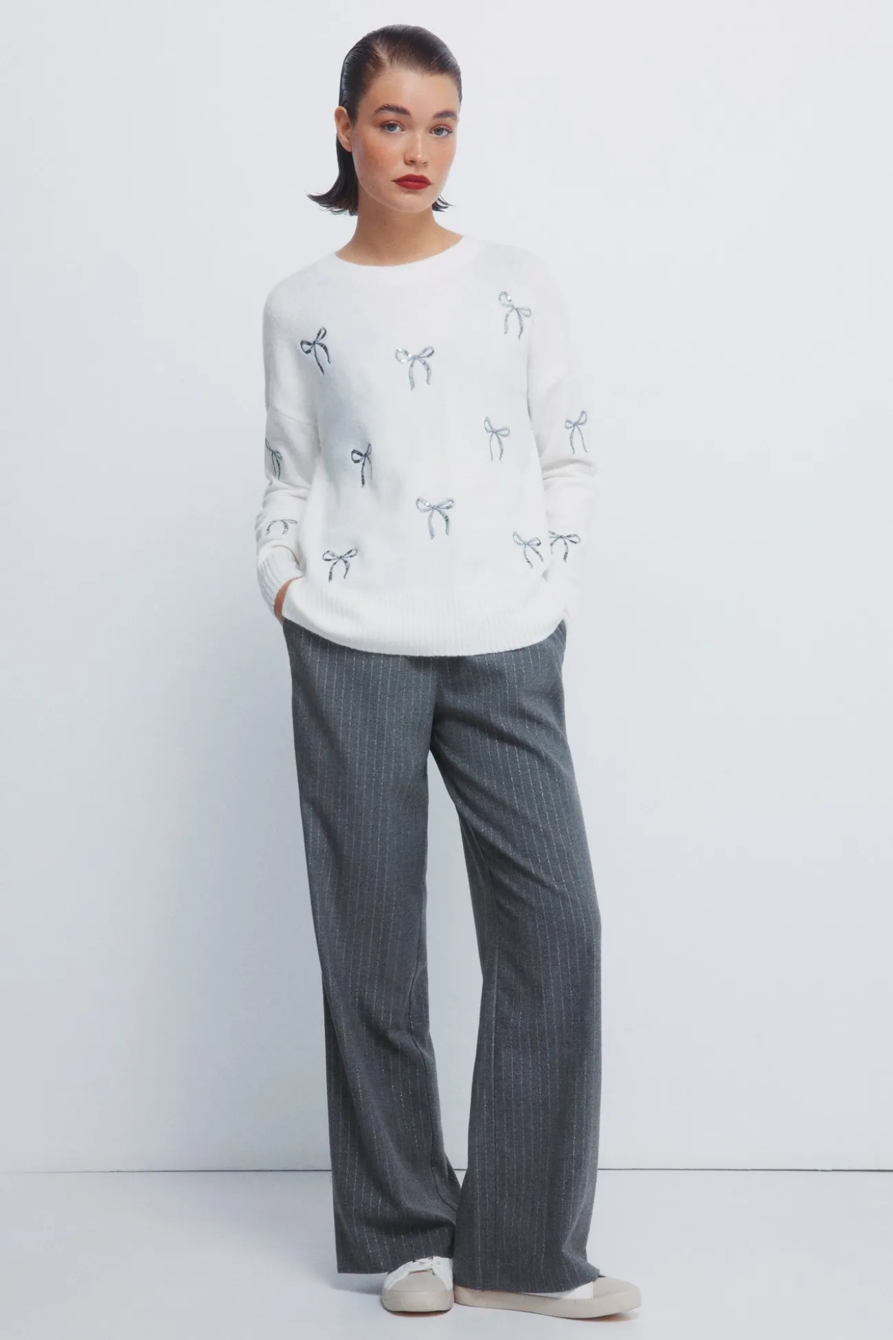 Pull avec nœuds à paillettes